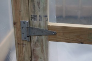 Greenhouse door hinge